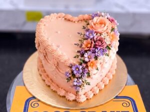 Peach Floral Heart Birthday Cake in Lahore