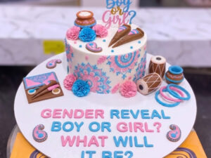 Pink Blue Dholki Gender Reveal Cake in Lahore