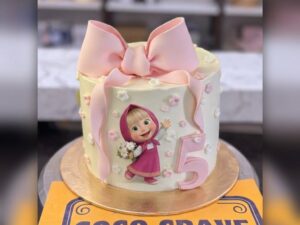 Pink Bow Doll Fifth Birthday Cake in Lahore