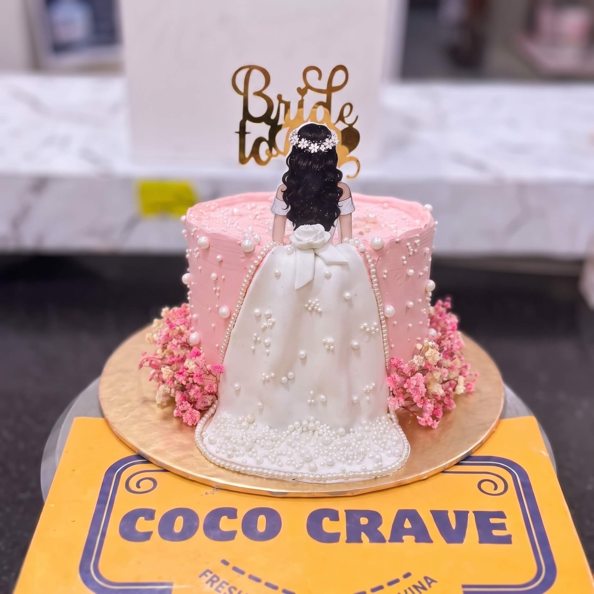 Pink Bride Figurine Floral Cake in Lahore Pink Bride Figurine Floral Cake in Lahore — CocoCrave Lahore