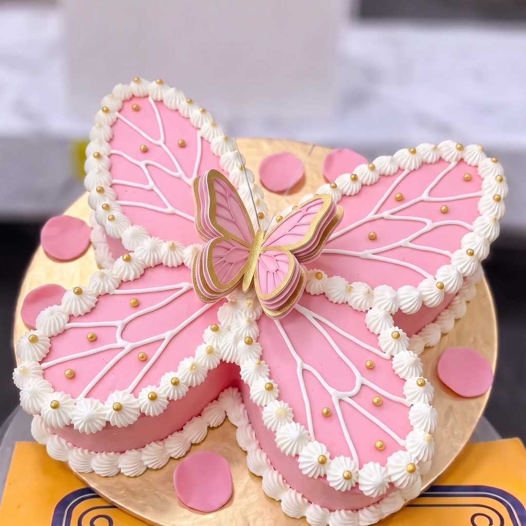 Pink Butterfly Cake with Pearls in Lahore — CocoCrave.pk Pink Butterfly Cake with Pearls in Lahore by CocoCrave.pk — single tier butterfly cake in Pink