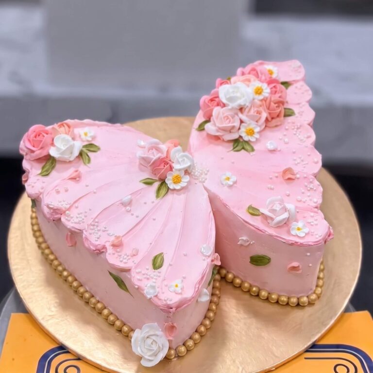 Pink Butterfly Shaped Floral Cake in Lahore