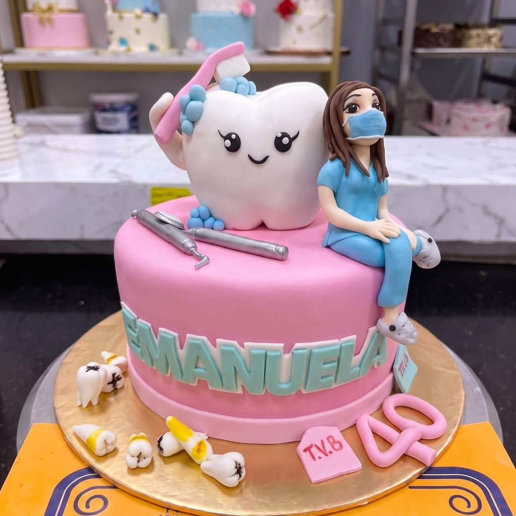Pink Dentist Cake with Tooth and Nurse in Lahore Pink Dentist Cake with Tooth and Nurse by CocoCrave.pk in Lahore