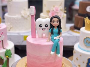 Pink Dentist Cake with Tooth and Toothbrush in Lahore — delivered in Bahria Town, Lahore