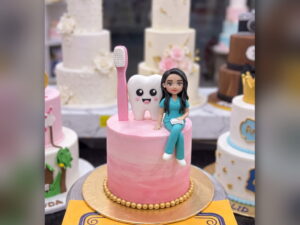Pink Dentist Cake with Tooth and Toothbrush in Lahore — CocoCrave.pk Lahore