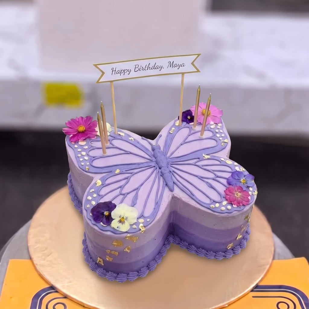 Purple Butterfly Shaped Birthday Cake in Lahore — CocoCrave.pk Purple Butterfly Shaped Birthday Cake in Lahore by CocoCrave.pk — single tier butterfly cake in Purple