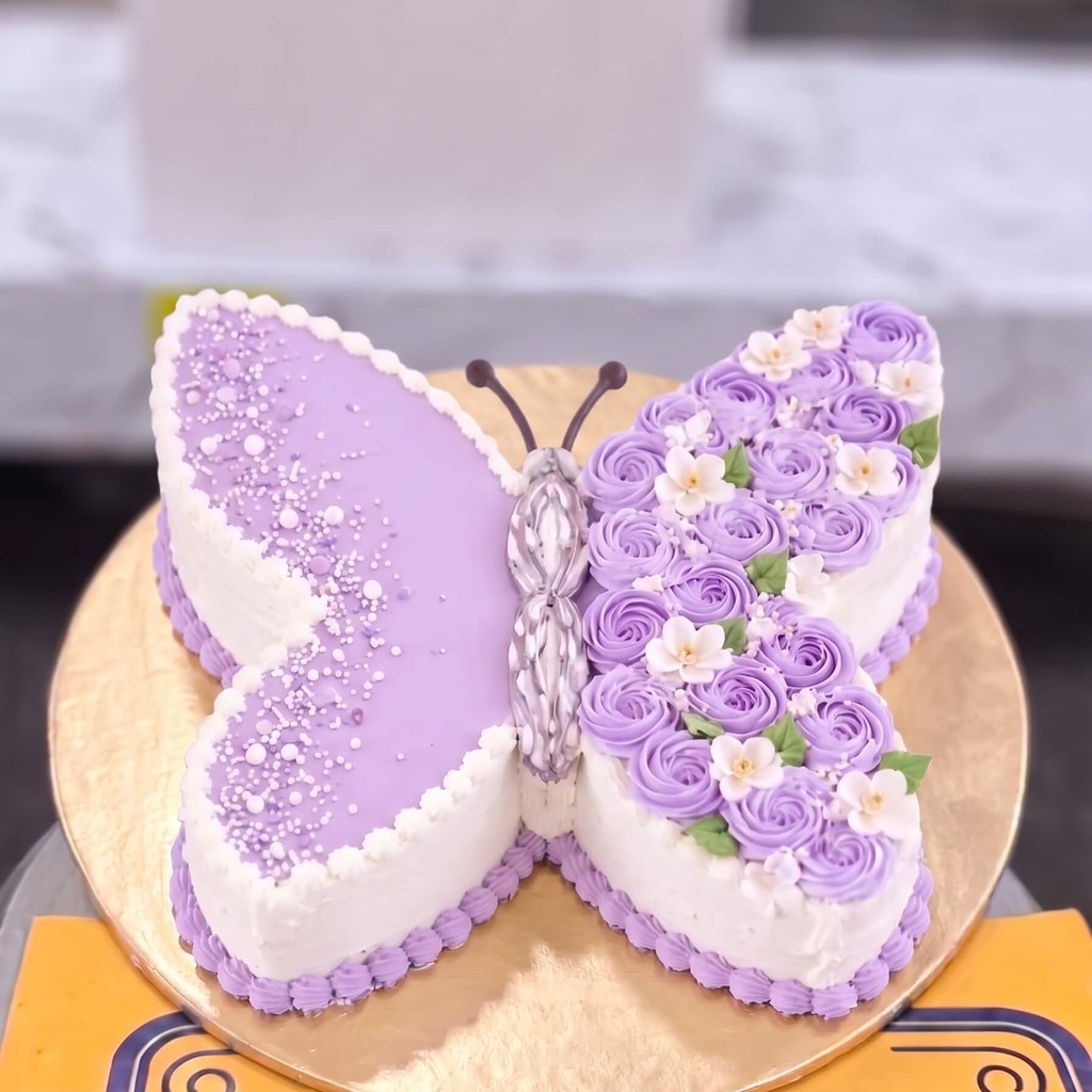 Purple Butterfly Shaped Cake in Lahore — CocoCrave.pk Purple Butterfly Shaped Cake in Lahore by CocoCrave.pk — single tier butterfly cake in Purple