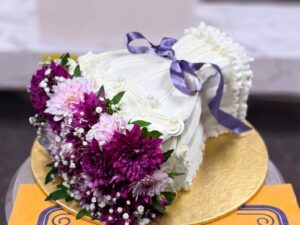 Purple Floral Ruffle Birthday Cake in Lahore