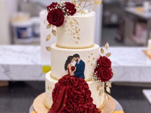 Red Gown Couple Three Tier Walima Cake in Lahore