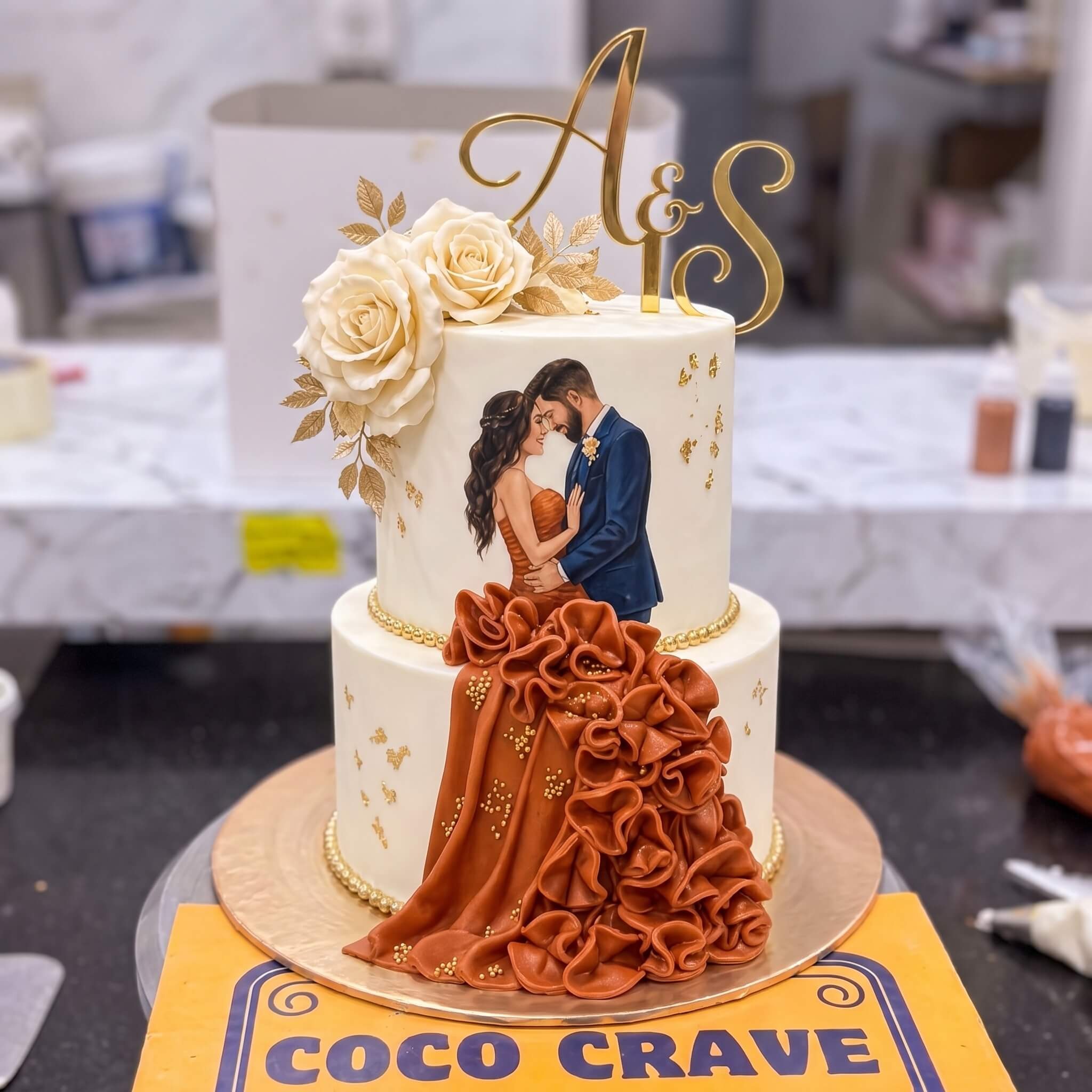 Rust Gown Couple Two Tier Walima Cake in Lahore Rust Gown Couple Two Tier Walima Cake in Lahore — CocoCrave Lahore