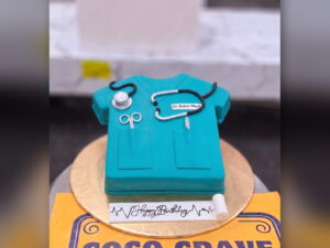 Teal Nurse Scrubs Cake in Lahore — CocoCrave.pk Lahore