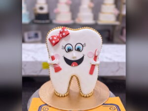 Tooth Shaped Dentist Cake in Lahore — CocoCrave.pk Lahore