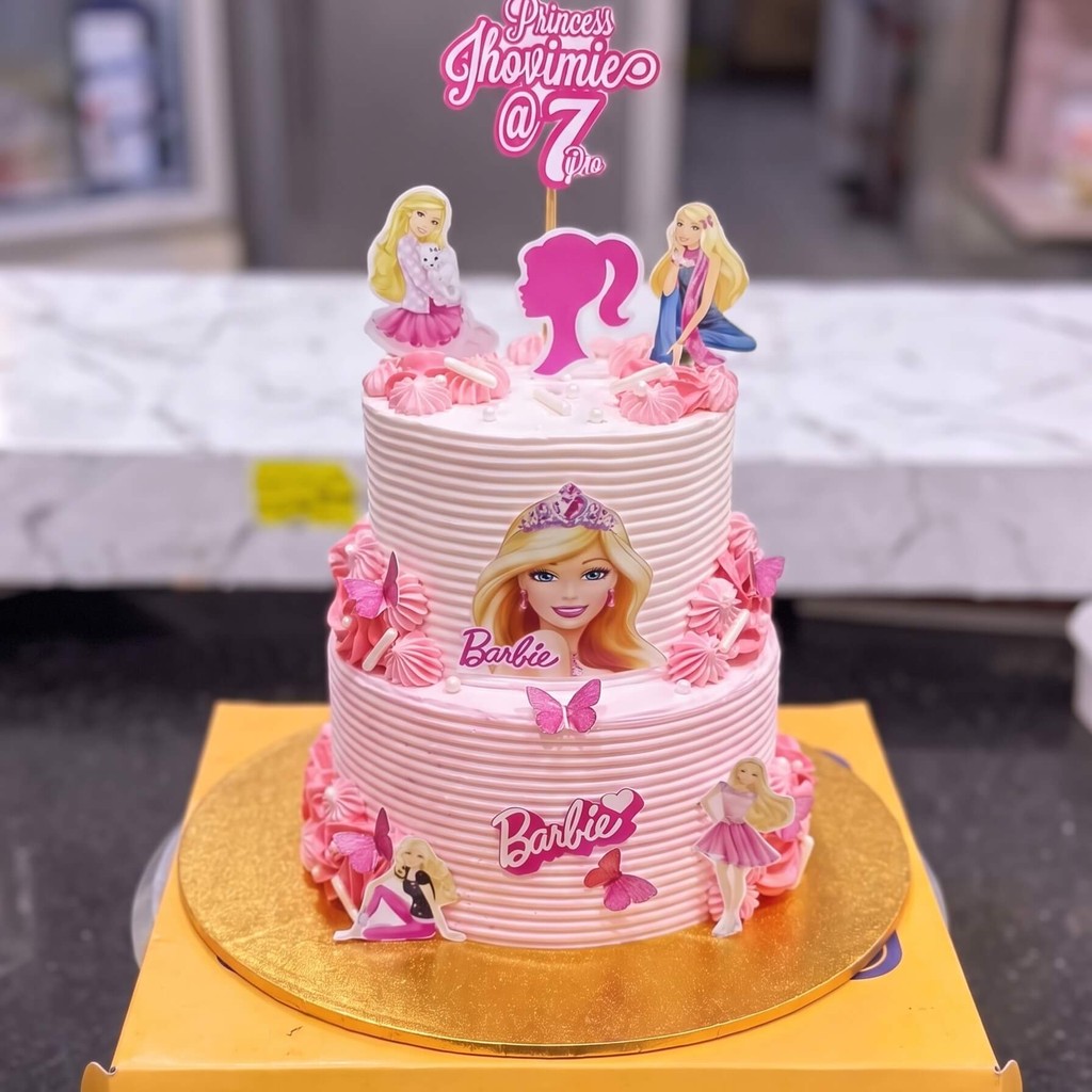 Two Tier Barbie Cake with Butterflies in Lahore Two Tier Barbie Cake with Butterflies by CocoCrave.pk in Lahore