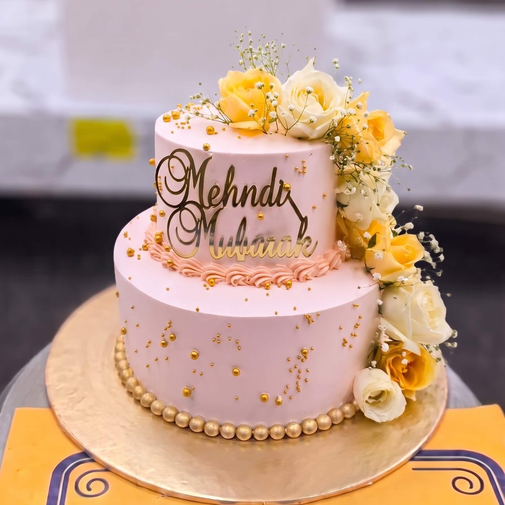 Two Tier Mehndi Cake with Flowers in Lahore Two Tier Mehndi Cake with Flowers by CocoCrave.pk in Lahore