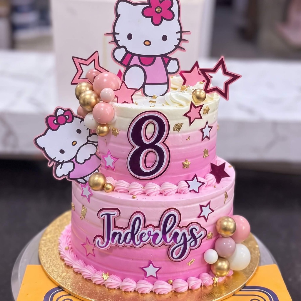 Two Tier Pink Hello Kitty Cake in Lahore Two Tier Pink Hello Kitty Cake by CocoCrave.pk in Lahore