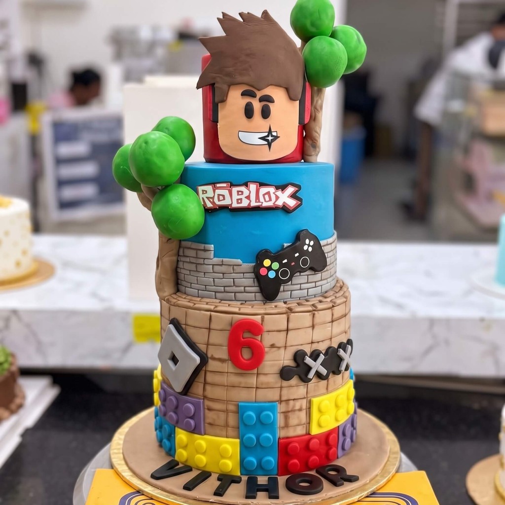 Two Tier Roblox Tower Birthday Cake in Lahore — CocoCrave.pk Two Tier Roblox Tower Birthday Cake in Lahore by CocoCrave.pk — two tier Roblox game cake