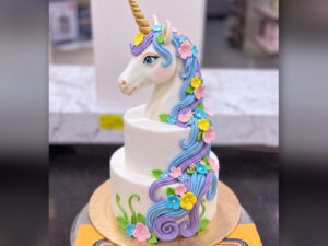 Two Tier Unicorn Figure Cake in Lahore