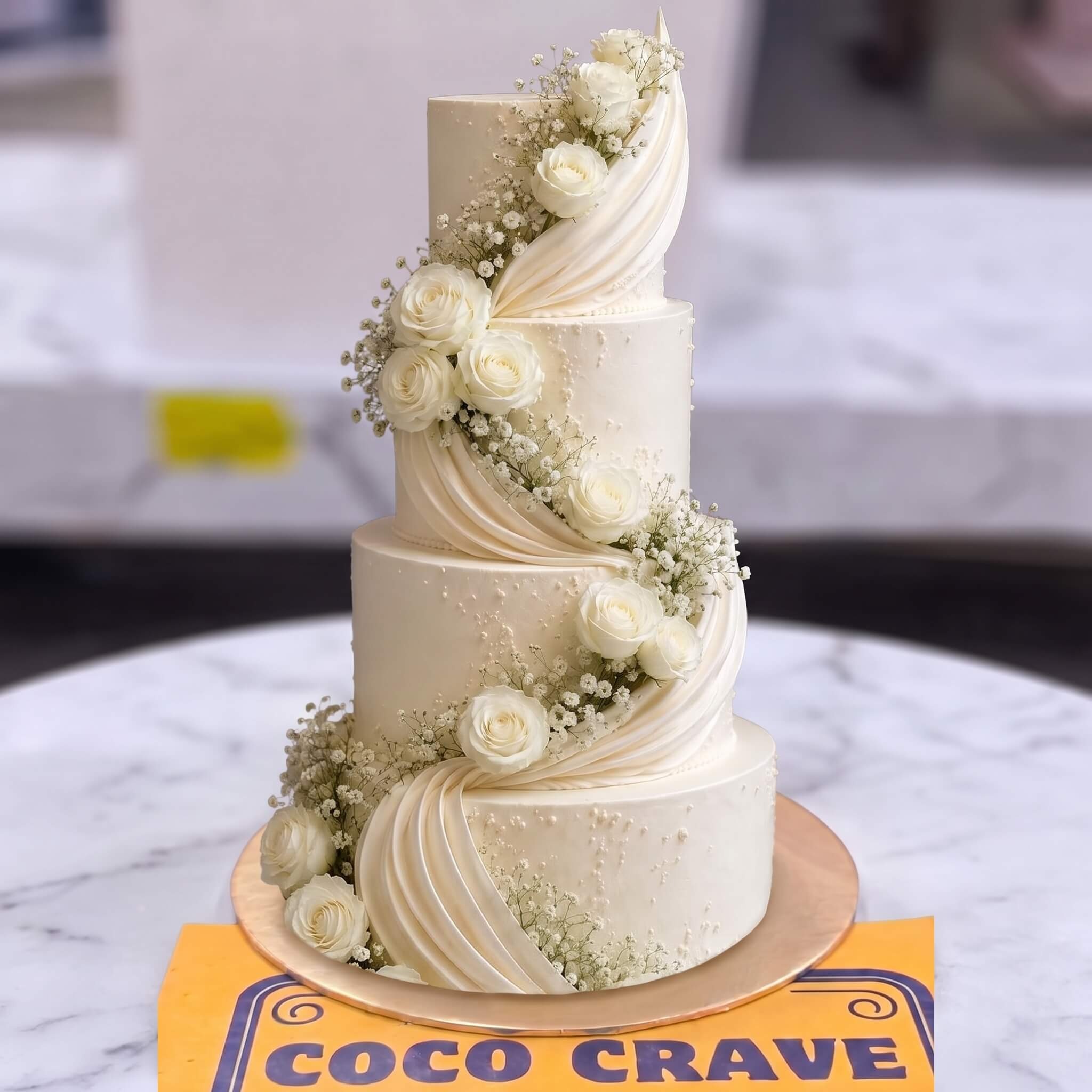 White Drape and Rose Four Tier Walima Cake in Lahore White Drape and Rose Four Tier Walima Cake in Lahore — CocoCrave Lahore