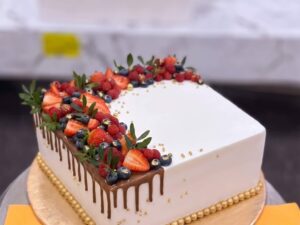 White Drip Cake with Strawberries in Lahore