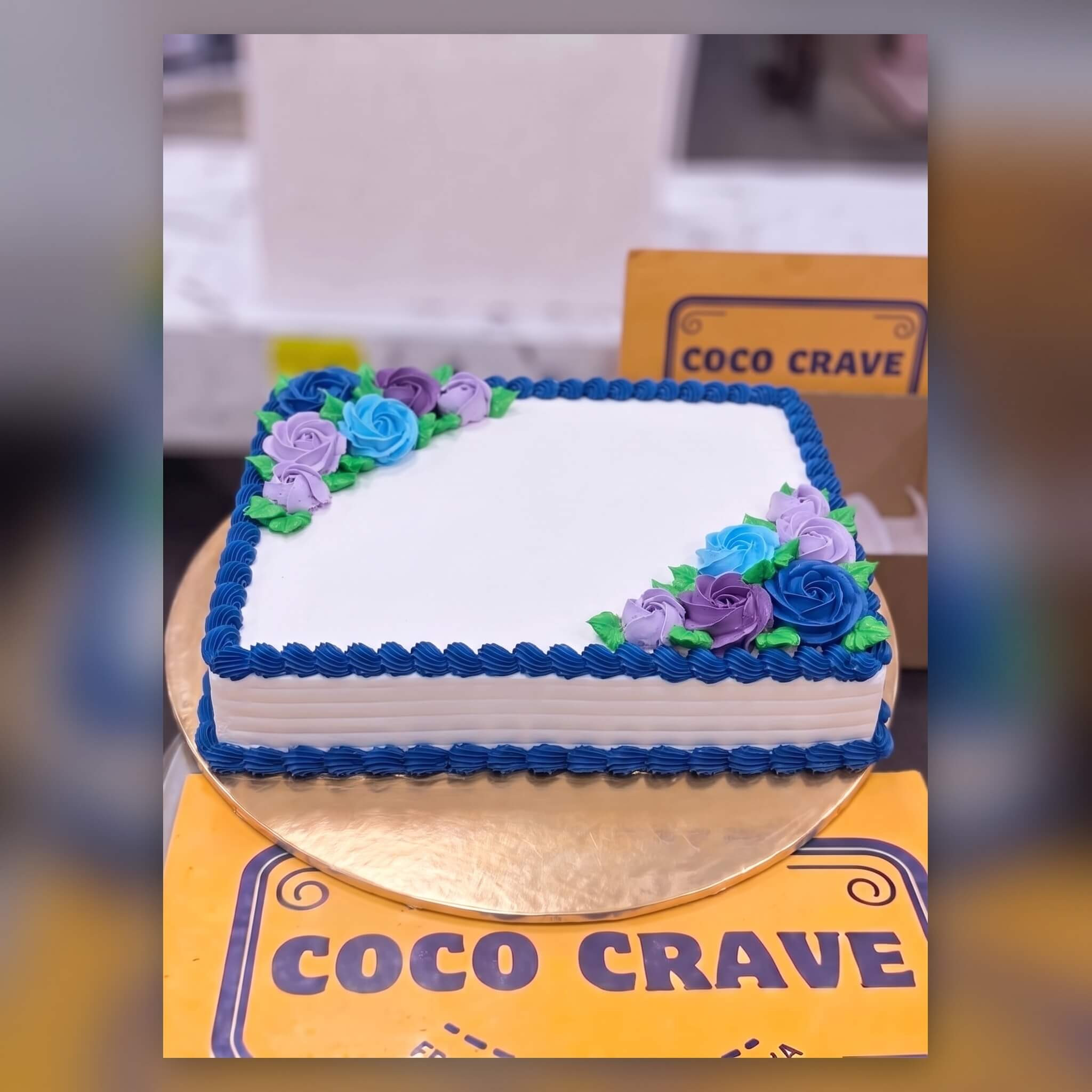 White Rectangle Cake with Blue Floral Border in Lahore White Rectangle Cake with Blue Floral Border in Lahore — CocoCrave Lahore