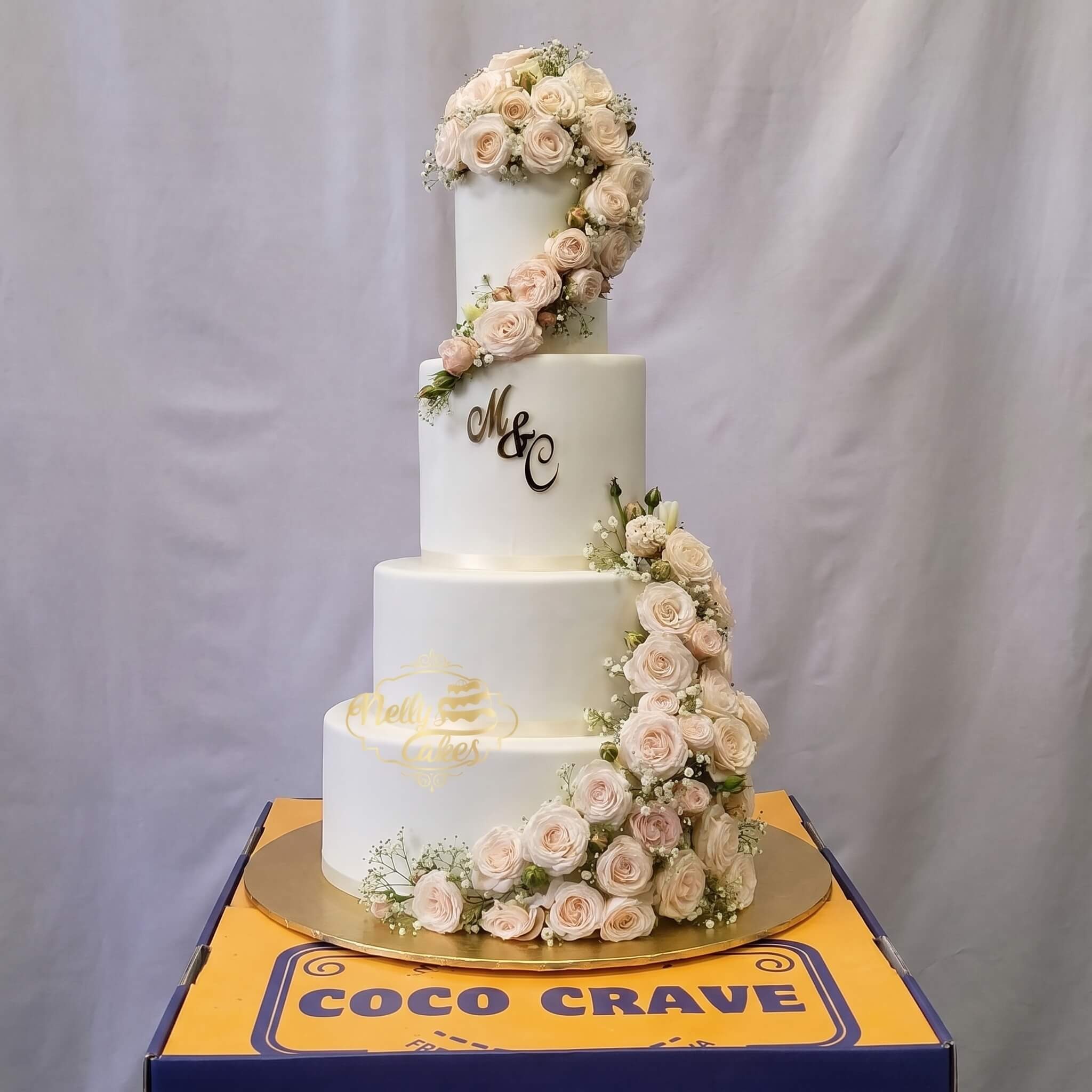 White Rose Cascade Four Tier Walima Cake in Lahore White Rose Cascade Four Tier Walima Cake in Lahore — CocoCrave Lahore