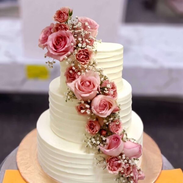 White Rose Cascade Wedding Cake in Lahore — delivered in Eme Society, Lahore