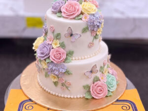 White Two Tier Pastel Rose Cake in Lahore — CocoCrave Lahore