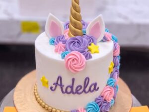 White Unicorn Cake with Purple Roses in Lahore