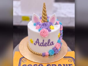 White Unicorn Cake with Purple Roses in Lahore
