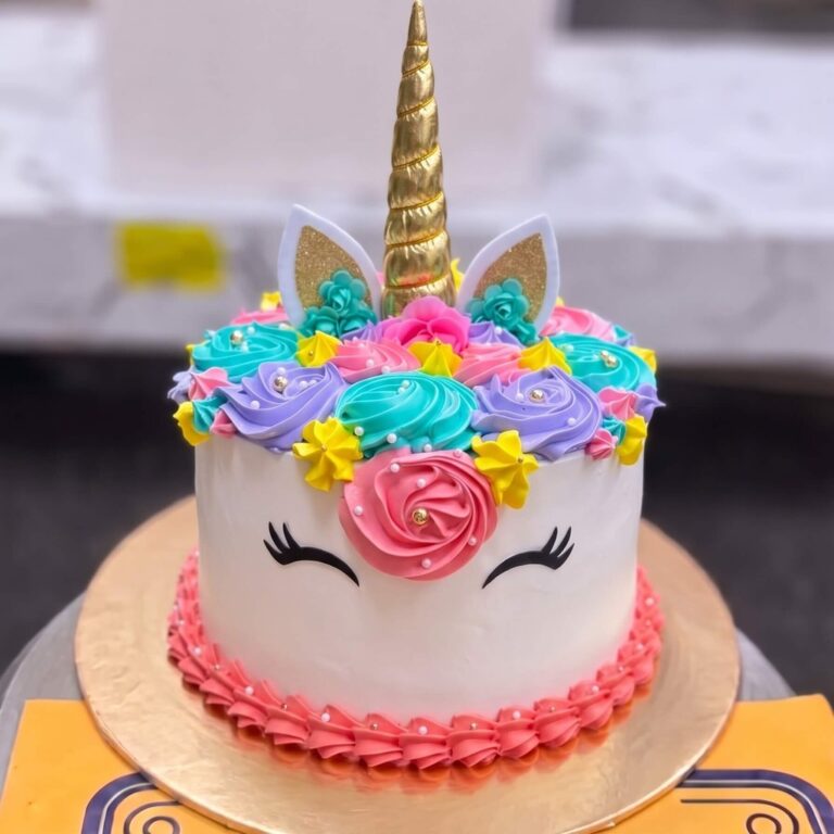 White Unicorn Cake with Rainbow Flowers in Lahore