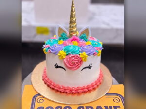 White Unicorn Cake with Rainbow Flowers in Lahore