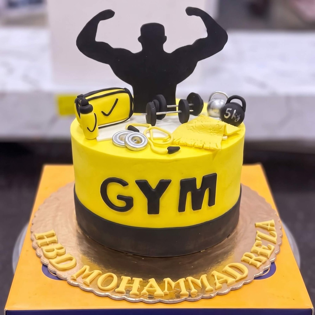 Yellow and Black Gym Cake in Lahore Yellow and Black Gym Cake by CocoCrave.pk in Lahore