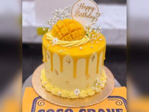 Yellow Mango Drip Birthday Cake in Lahore