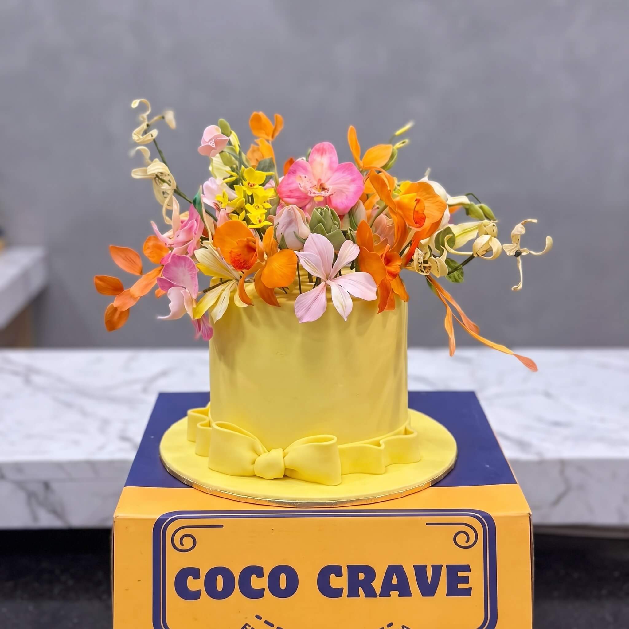 Yellow Orchid Fresh Floral Cake in Lahore Yellow Orchid Fresh Floral Cake in Lahore