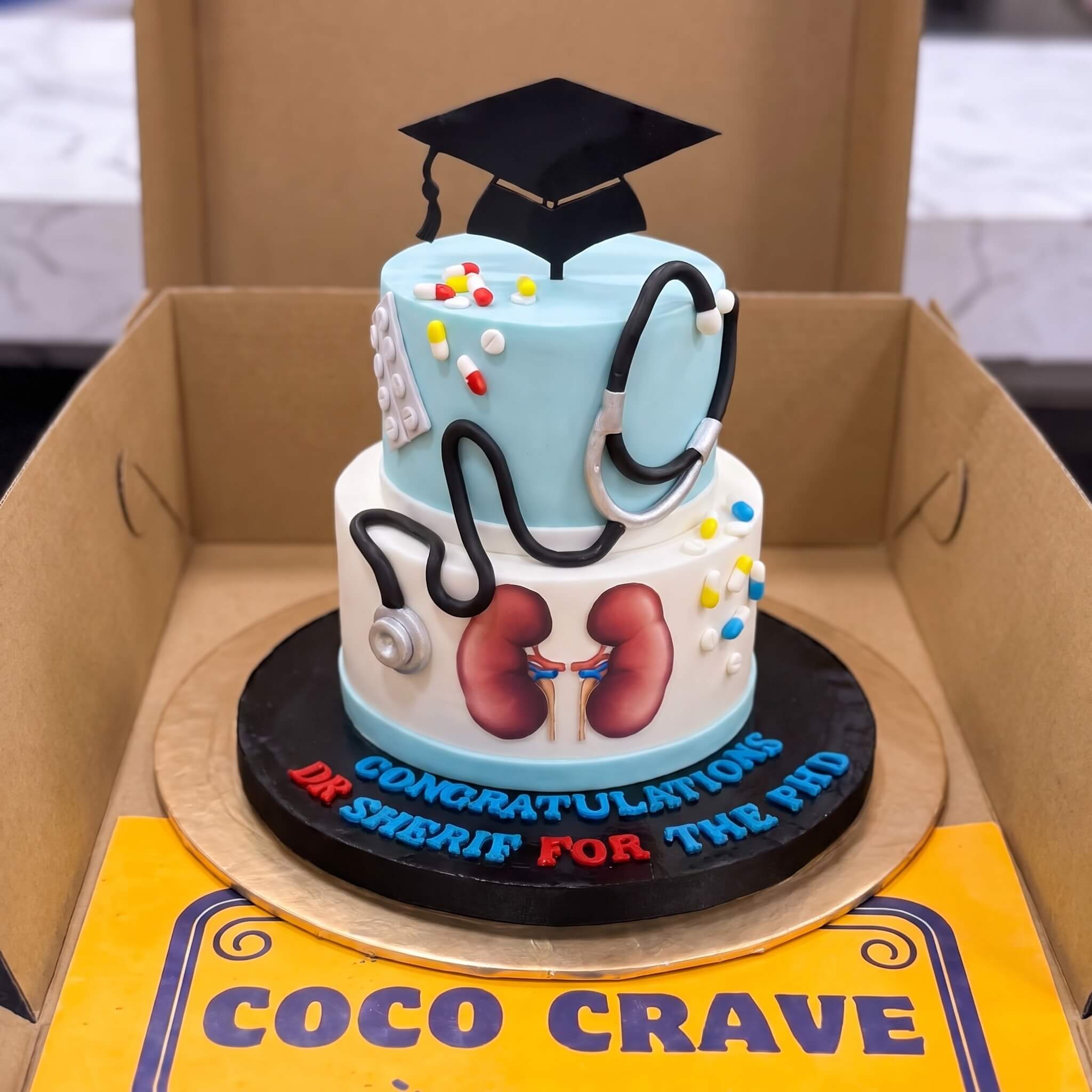 Doctor Medical Theme Two Tier Cake in Lahore Doctor Medical Theme Two Tier Cake in Lahore — CocoCrave Lahore