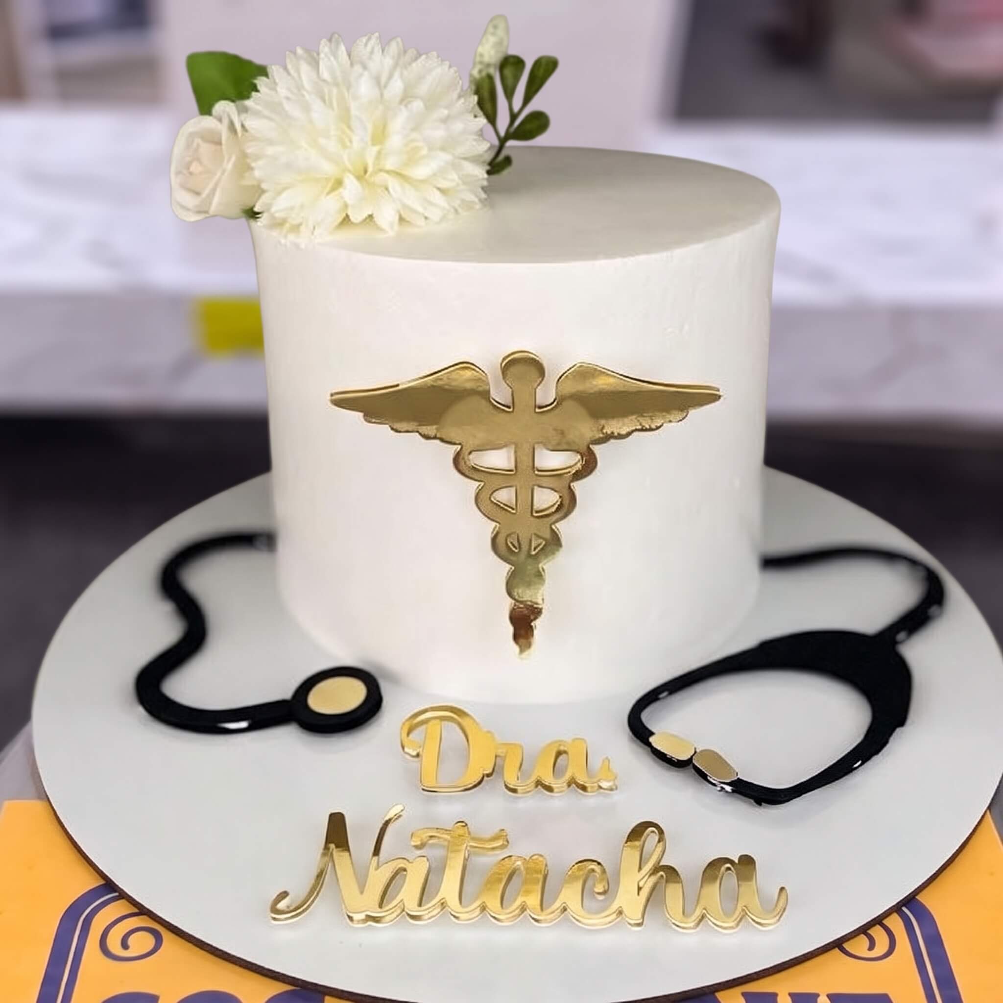 Gold Medical Caduceus Doctor Cake in Lahore Gold Medical Caduceus Doctor Cake in Lahore — CocoCrave Lahore