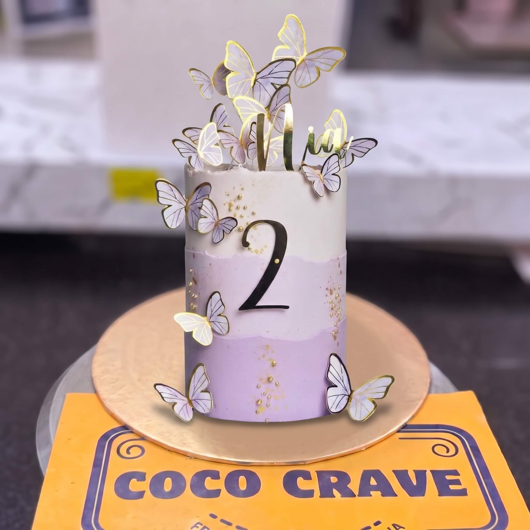 Lilac Butterfly Second Birthday Cake in Lahore Lilac Butterfly Second Birthday Cake in Lahore — CocoCrave Lahore