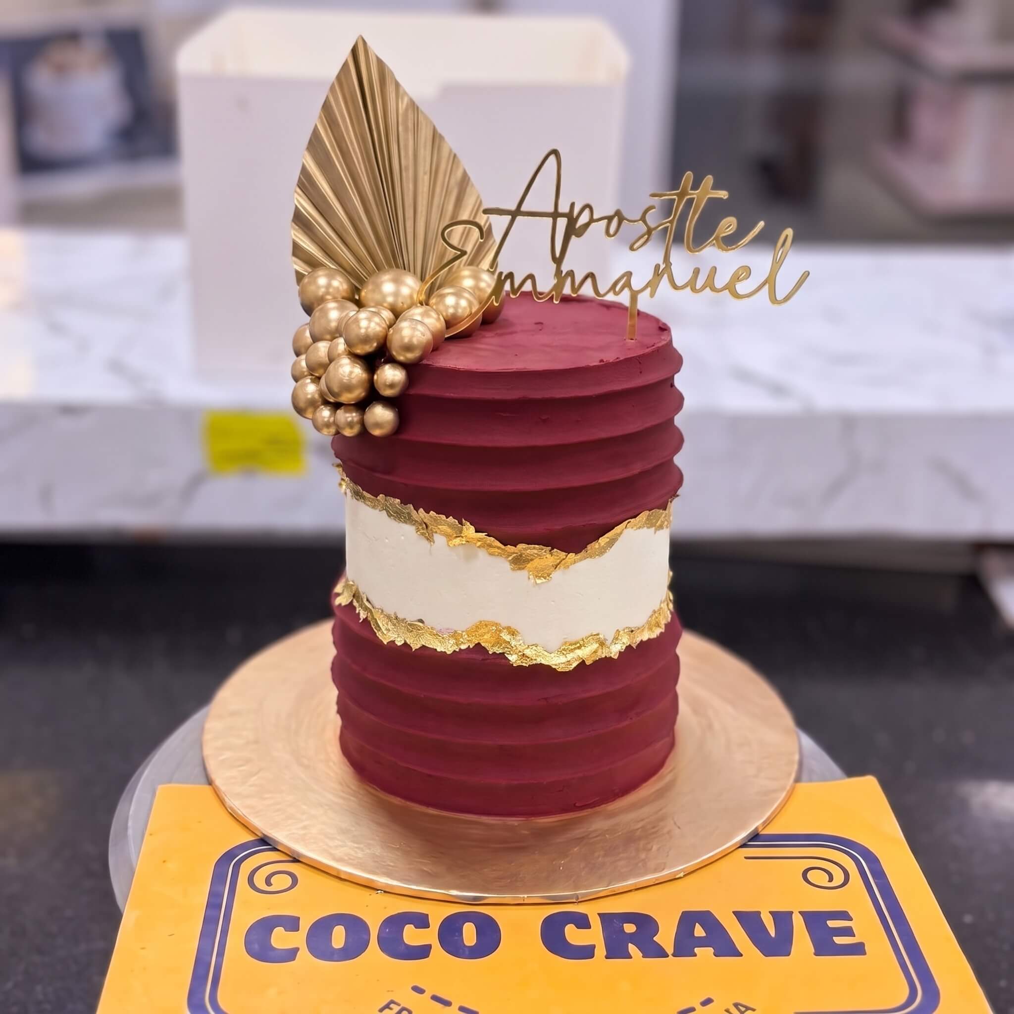 Maroon and Gold Fault Line Cake in Lahore Maroon and Gold Fault Line Cake in Lahore — CocoCrave Lahore
