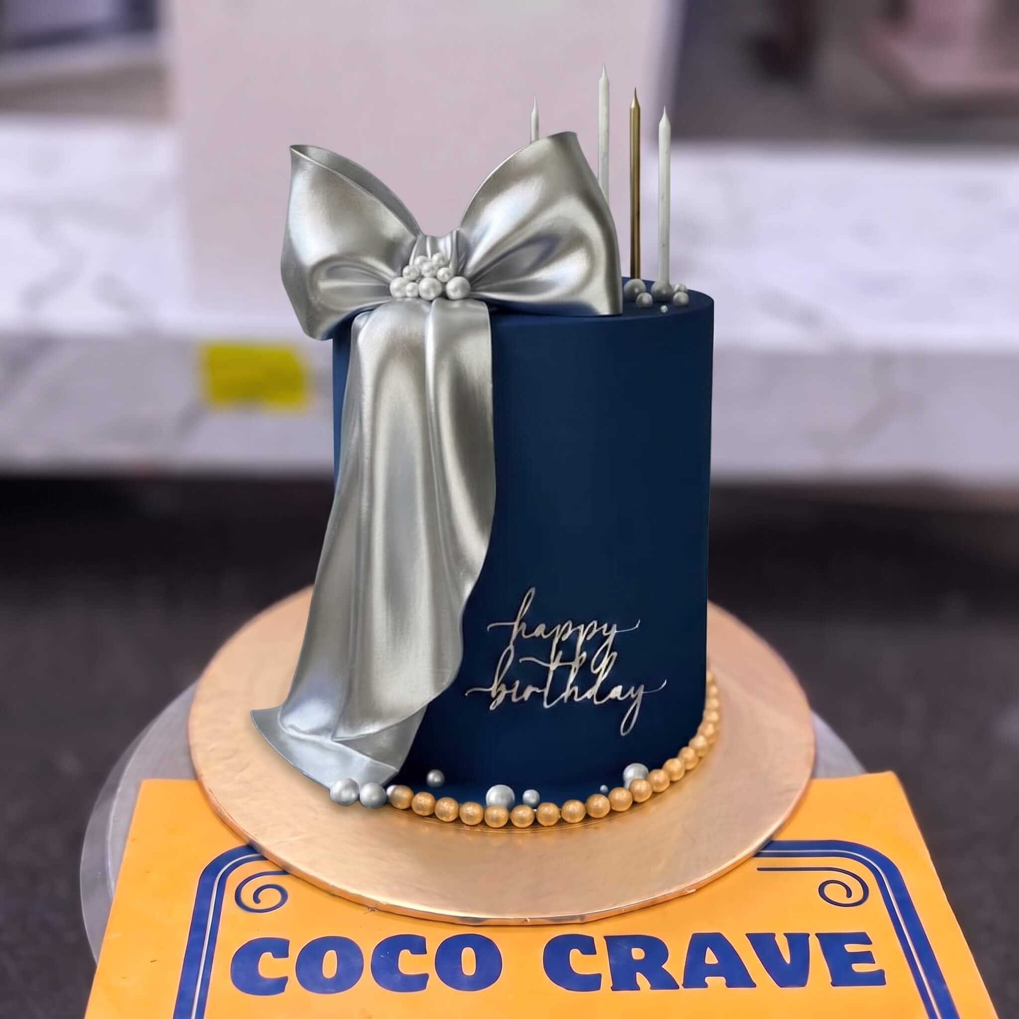 Navy Blue Silver Bow Birthday Cake in Lahore Navy Blue Silver Bow Birthday Cake in Lahore — CocoCrave Lahore