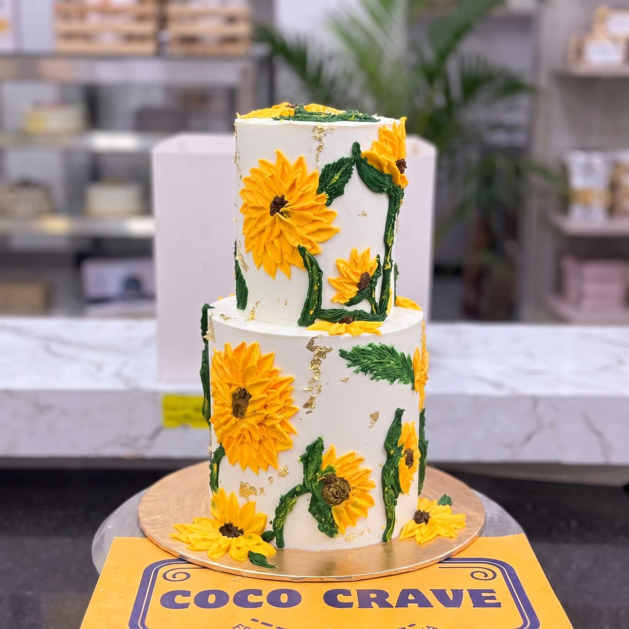 White Sunflower Buttercream Two Tier Cake in Lahore White Sunflower Buttercream Two Tier Cake in Lahore