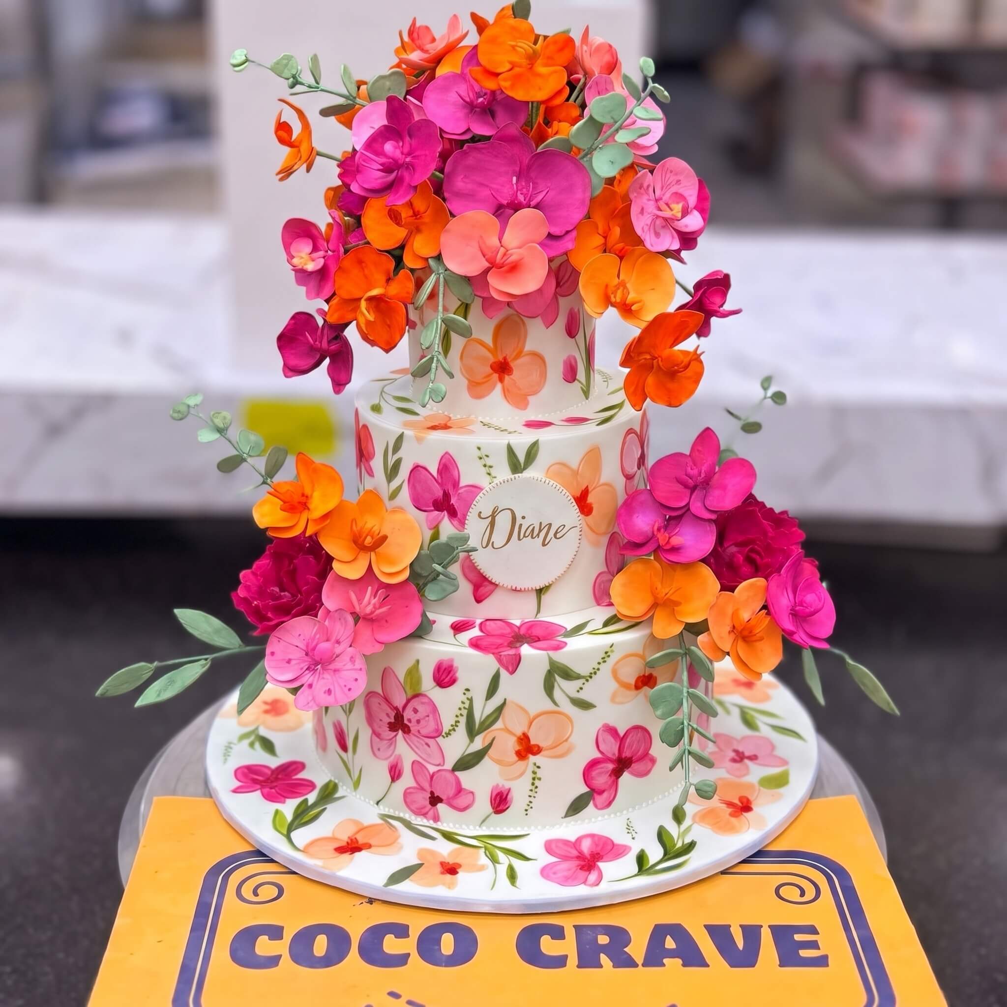 Pink and Orange Floral Three Tier Cake in Lahore Pink and Orange Floral Three Tier Cake in Lahore — CocoCrave Lahore