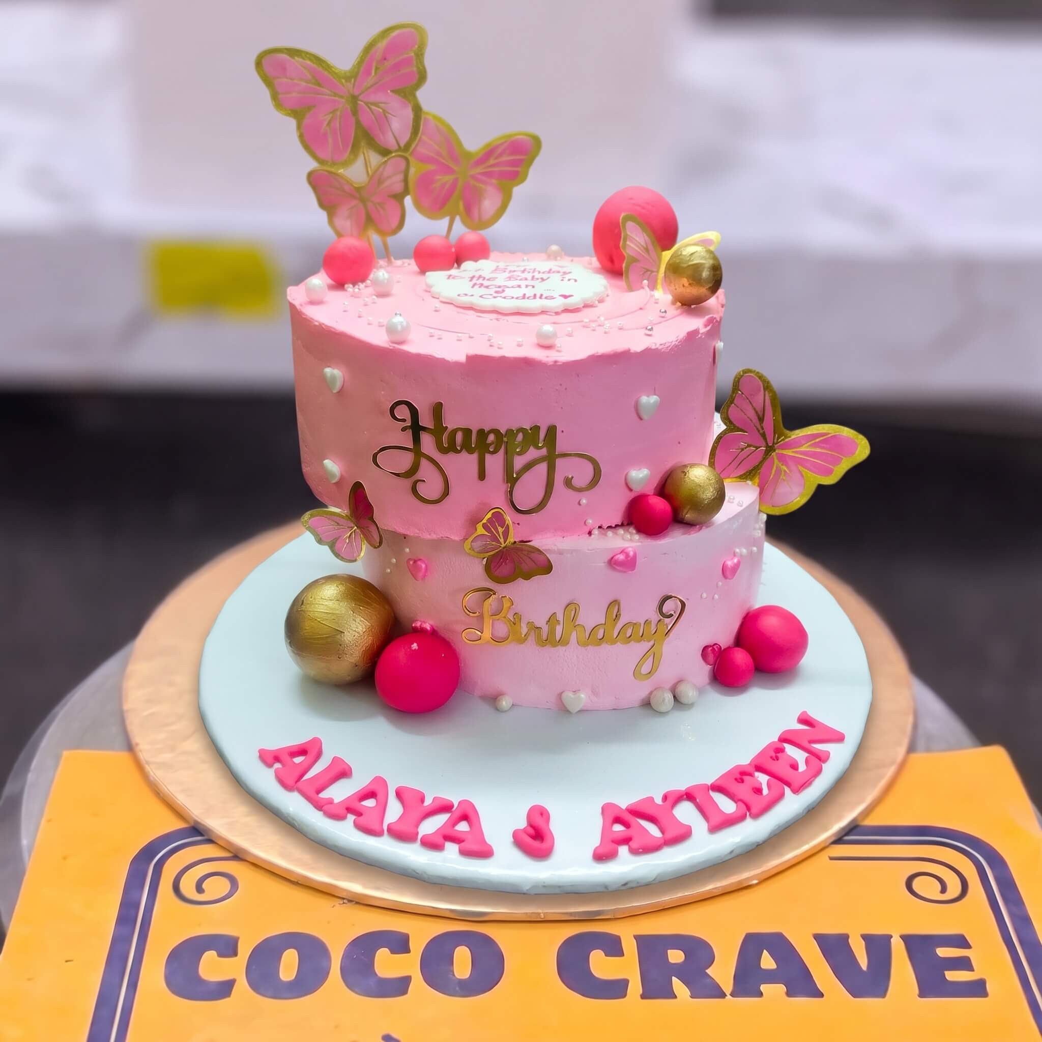 Pink Butterfly Two Tier Birthday Cake in Lahore Pink Butterfly Two Tier Birthday Cake in Lahore — CocoCrave Lahore